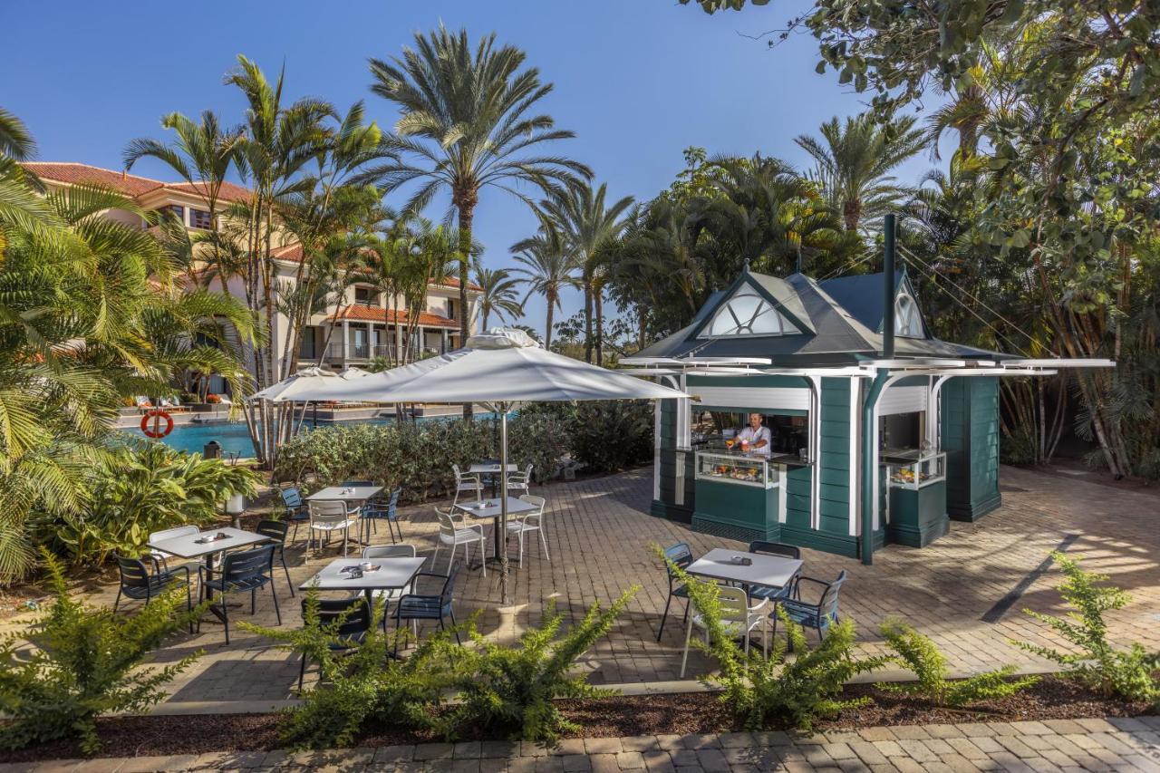 Lopesan Costa Meloneras Resort & Spa المظهر الخارجي الصورة The pool bar at the hotel